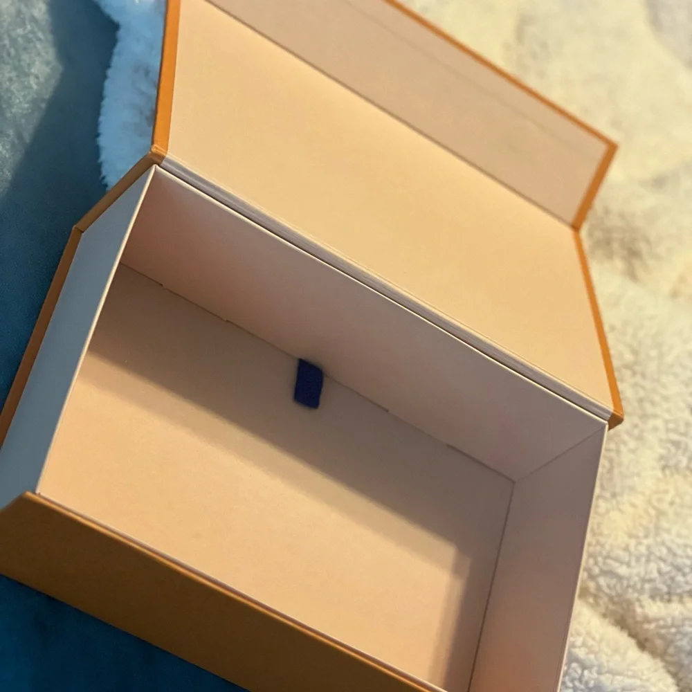 Wallet storage box and dust bag from Louis Vuitton